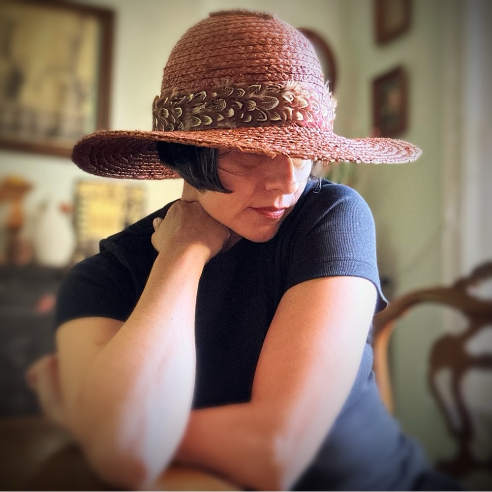 Brown Wide-Brimmed Hat with Decorative Detailing